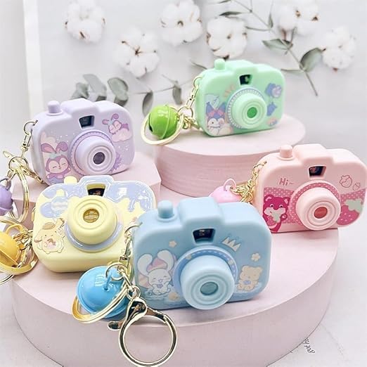 Cute Mini Projector Camera Toy with Bell for Kids and Girls, Style Multicolor Design, Light Projection Feature, Fun Cartoon Keychain for Bags, Pouches, Zippers & Gifting